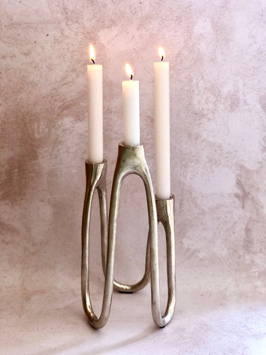 METAL THREE TIERRED CANDLE STICKS